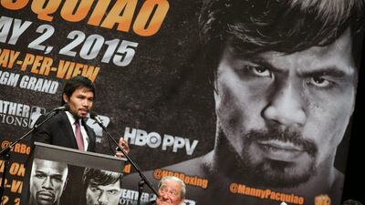 Filipino boxer Manny Pacquiao speaks at the podium during Wednesday's press conference to promote the May 2 Pacquiao v Mayweather superfight. Jonathan Alcorn / EPA