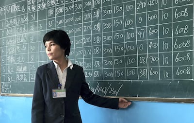 A computing instructor at the Moyu County Vocational Skills Education and Training Centre in Hotan