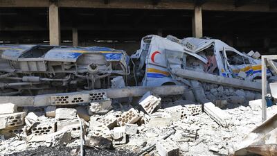 Destroyed ambulances and vehicles of the Syrian Civil Defence, also known as "The White Helmets" at their captured former headquarters in the town of Qalaat Al Madiq, some 45 kilometres northwest of the central city of Hama. AFP