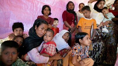 Rohingya patients wait for medical care at a government run medical clinic November 25, 2012 on the outskirts of Sittwe, Myanmar. Paula Bronstein / Getty Images