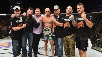 Robbie Lawler poses with his teammates after defeating Johny Hendricks in their UFC welterweight championship bout during UFC 181 inside the Mandalay Bay Events Center on December 6, 2014 in Las Vegas, Nevada. Getty Images