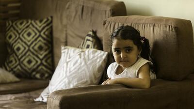 Rama Al Khobi, 3, was the recipient of a cochlear implant through the Al Jalila Foundation's A’awen programme that provides medical treatment to those unable to afford quality healthcare. Christopher Pike / The National
