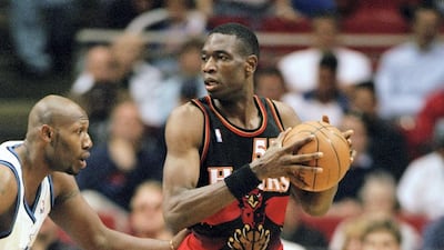 Dikembe Mutombo plays in an NBA game for the Atlanta Hawks in 1999. Getty Images
