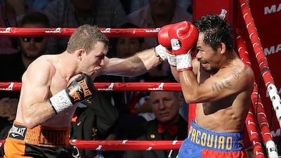 Jeff Horn of Australia, left, lands a left to Manny Pacquiao of the Philippines during their WBO World Welterweight title fight in Brisbane, Australia, Sunday, July 2, 2017. AP Photo