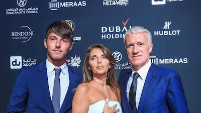 France manager Didier Deschamps with his son Dylan and wife Claude at the red carpet during the Global Soccer Awards at the Madinat Jumeirah in Dubai on Thursday. Victor Besa / The National