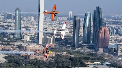 Matthias Dolderer of Germany leads Martin Sonka of Czech Republic and Nicolas Ivanoff of France along the skyline of the city of Abu Dhabi before the first stage of the Red Bull Air Race World Championship on February 6, 2017. The race returns to the capita on the weekend of February 2 and 3 capital. Courtesy: Red Bull