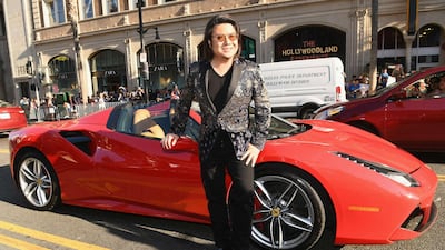 Author Kevin Kwan is wanted for mandatory military service in Singapore. AFP