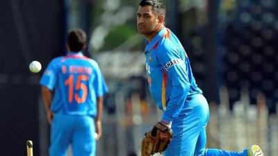 MS Dhoni took part in the warm-up before the start of the second innings in India's match against Sri Lanka. Jewel Samad / AFP