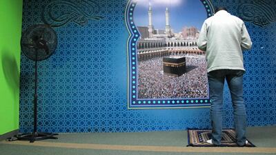 Ahmed Khalaf, an employee with the Federation of Muslim Associations in Brazil (Fambras), inside the prayer room at Fambras's headquarters. Gary Meenaghan for The National