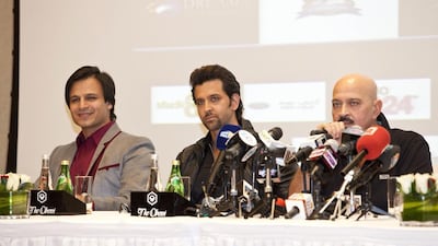 From left, Vivek Oberoi, Hrithik Roshan and Rakesh Roshan at a press conference for Krrish 3 in Dubai. Razan Alzayani / The National