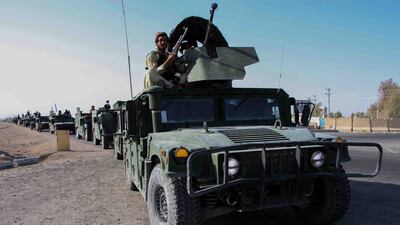Taliban forces rally to celebrate the withdrawal of US forces in Kandahar, Afghanistan. EPA