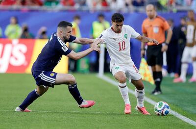 Scotland's John McGinn, left, in action with Morocco's Brahim Diaz. Reuters