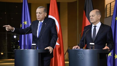 German Chancellor Olaf Scholz, right, and Turkish President Recep Tayyip Erdogan address a joint press conference before talks in Berlin. AFP