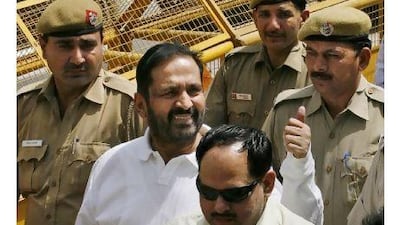 Suresh Kalmadi, the Commonwealth Games chief organiser, second from the left, who was arrested on Monday by India’s Central Bureau of Investigation, arriving for a court hearing in Delhi on Tuesday.