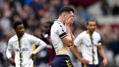 Keane walks off the pitch after being sent off. Reuters
