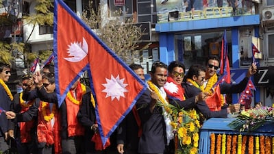 The Nepal cricket team returned home on Wednesday to a parade. Prakash Mathema / AFP