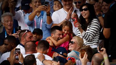 Novak Djokovic of Serbia celebrates with his family after winning against Carlos Alcaraz of Spain. EPA