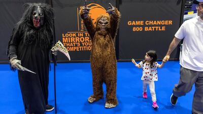 This young convention-goer wasn't scared by the beasts. Antonie Robertson / The National