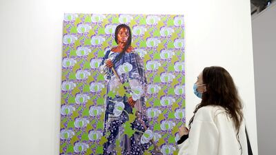 A portrait of Mame Kewe Aminata Lo by Kehinde Wiley at Galerie Templon, Art Dubai 2021. Chris Whiteoak / The National