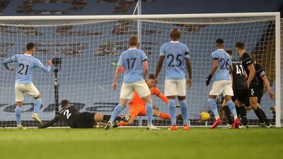 Manchester City's midfielder Ferran Torres scores his team's fourth goal. AFP