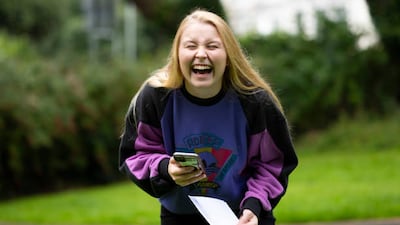 Georgia Davies smiles after opening her A-level results at Ffynone House School in Swansea.