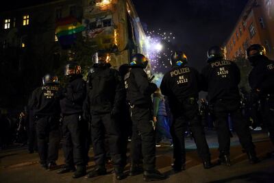 File photo: Police officers stand guard as supporters of the left-wing Liebig 14 housing project protest in Berlin. Reuters