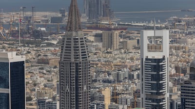The Dubai skyline as seen from Burj Khalifa. Investors in the UAE are more active in their plans compared to their global peers, an HSBC study has shown. Antonie Robertson / The National