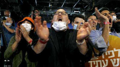 Supporters cheer during a Yesh Atid party event in Tel Aviv. Bloomberg