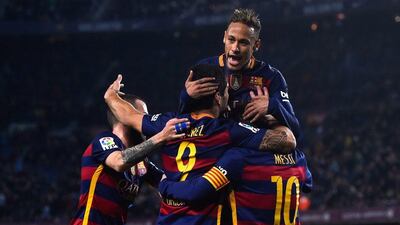 Luis Suarez celebrates with his teammates after scoring Barcelona’s sixth goal. David Ramos / Getty Images