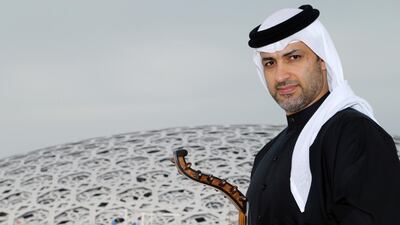 Faisal Al Saari with his oud in front of Louvre Abu Dhabi. Courtesy Abu Dhabi Tourism & Culture Authority