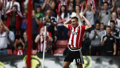 Southampton's Dusan Tadic celebrates after scoring their second goal on Sunday against Norwich City at St Mary's Stadium. Justin Tallis / AFP