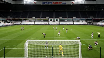 Newcastle United's Ciaran Clark (bottom right) reacts after scoring an own goal. PA