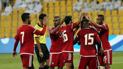 UAE players celebrate Ali Mabkhout's goal against Yemen on Tuesday. Satish Kumar for The National