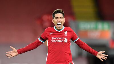 Roberto Firmino celebrates the winner after extending Liverpool's record in the 2-1 win over Tottenham on December 17, 2020. AP