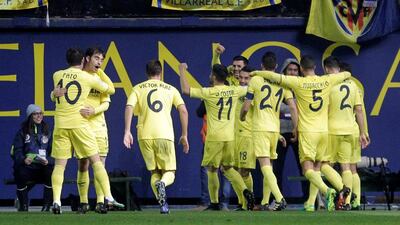 Villarreal players celebrate their lone goal. Heino Kalis / Reuters