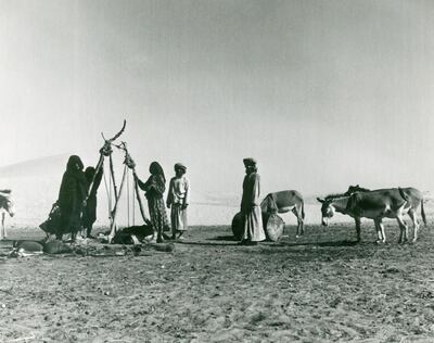 Many time zones abounded in the region in the 1950s and 1960s. Pictured: Bedouins with their donkeys at a water well in the desert in the Trucial States, between Sharjah and Manama. Getty Images