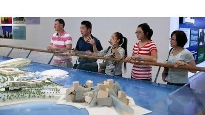 Chinese tourists visit the Emirates Palace. Countries as far afield as South Korea and the UAE are targeting visitors from China.