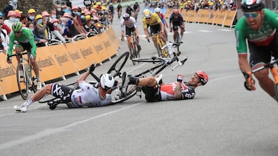 Australian rider Caleb Ewan of Lotto Soudal and Slovakian rider Peter Sagan of Bora-Hansgrohe crash shortly before the finish line of the third stage of the Tour de France on Monday, June 28, 2021. EPA