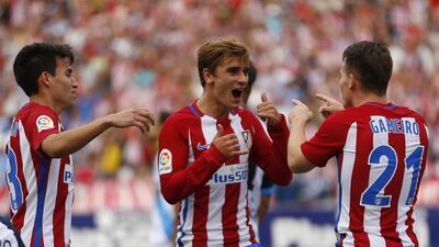 Antoine Griezmann, centre, was named Primera Liga player of the season for 2015/16. Francisco Seco / AP Photo