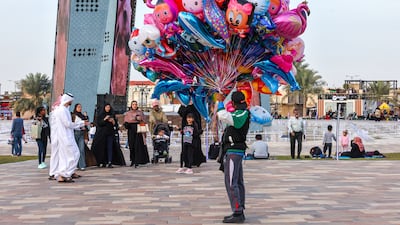 Visitors arrive at the Sheikh Zayed Heritage Festival, at Al Wathba. Victor Besa / The National