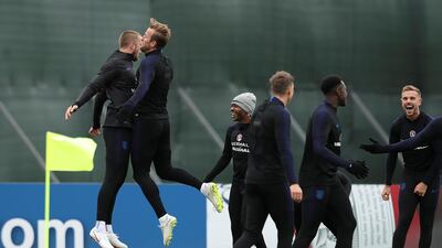 Harry Kane, Eric Dier and their teammates attend a training session. Lee Smith / Reuters