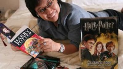 Edelita DeGuzman with her Harry Potter collections. "Sometimes I think, what would it be like to live with Harry Potter?" she says.