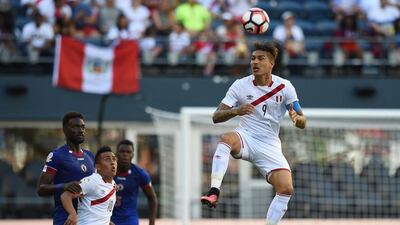 Peru’s Paolo Guerrero takes control of the ball. Mark Ralston / AFP