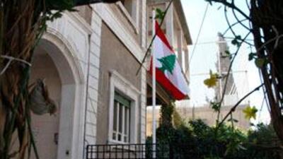 A Lebanese flag flies in front of the newly-opened Lebanon embassy building in Damascus.