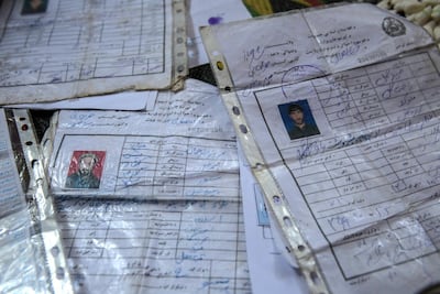 The ID documents of the seven people from Javari village who were killed in a drone strike on September 19, 2019. Stefanie Glinski for The National