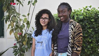Lamia Makkar, left, and Tasneem Zarroug, from the Abu Dhabi Community School. They worked to fund trips to aid community projects in Cambodia and in Haiti during the summer holidays. Lee Hoagland / The National