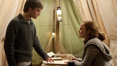 Daniel Radcliffe, left, and Emma Watson in a scene from Harry Potter and the Deathly Hallows: Part 1. Warner Bros Pictures / Jaap Buitendijk / AP Photo