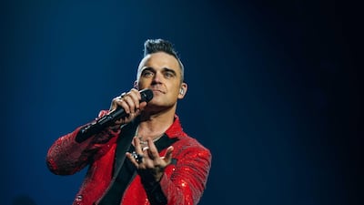 Singer Robbie Williams's life story will be told on screen. Shutterstock
