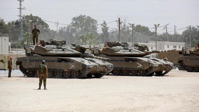 Israeli soldiers on tanks are stationed few kilometres from the border with Gaza. Reports state the Israeli military said Palestinian militants in Gaza on 29 May fired more than 100 projectiles and rockets into Israel. Abir Sultan/ EPA