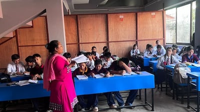 The community hopes authorities will set aside land for the new school building so they can move out of temporary classrooms set up in stairwells. Photo: Rajendra Dawadi